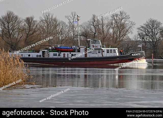 24 February 2021, Brandenburg, Kienitz: The icebreaker ""Kienitz"" is underway upstream on the German-Polish border river Oder in the Oderbruch