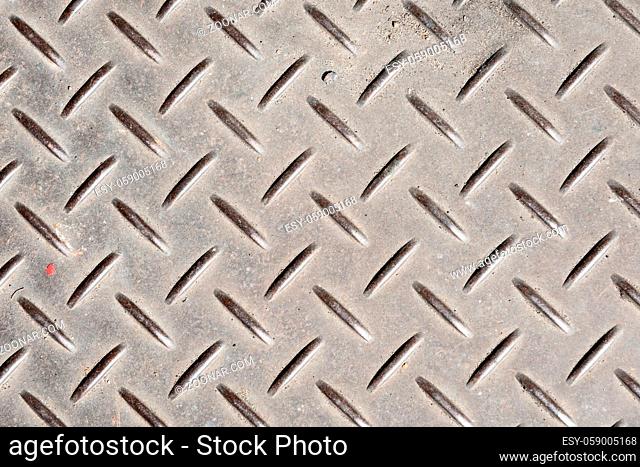 background of metal diamond plate in brown color