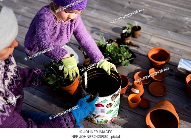 Mother and daughter potting plant