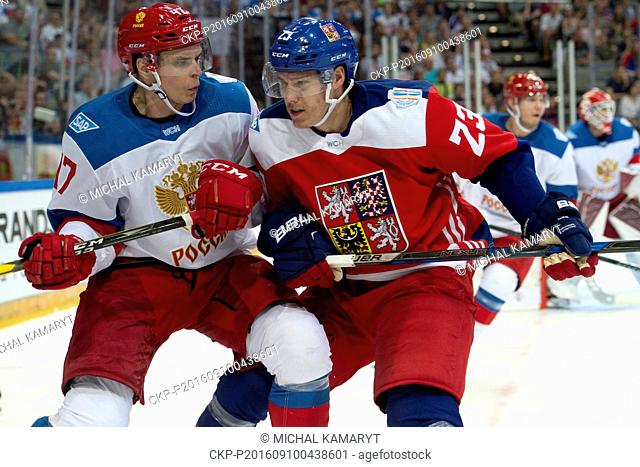 Alexei Marchenko (RUS), left, and Dmitrij Jaskin (CZE) in action during the pre-tournament World Cup of Hockey 2016 match Czech Republic vs Russia, in Prague