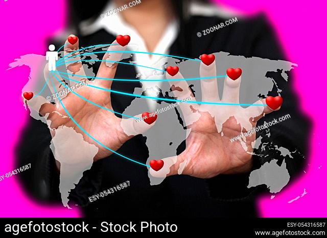 Woman Hand Find Love Around the World using in Love Valentine Holiday Concept (Selective focus at Finger)