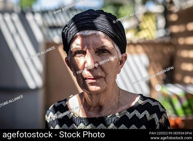 18 May 2022, Israel, Kiryat Bialik: Masal Berko stands in the garden of her house. Her parents had come to Haifa from the Tunisian island of Djerba with their...