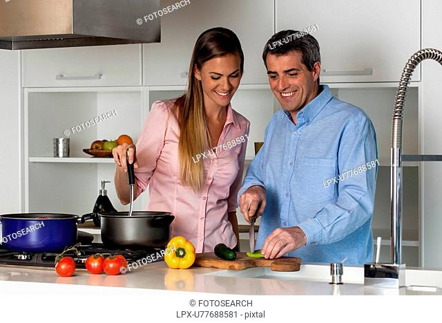 couple cooking in the kitchen