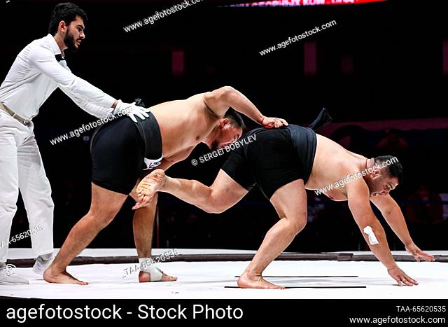 RUSSIA, MOSCOW - DECEMBER 10, 2023: The men's bronze-medal openweight bout between Aidyn Mongush of Russia and Amir Ghajar of Iran takes place as part of the...