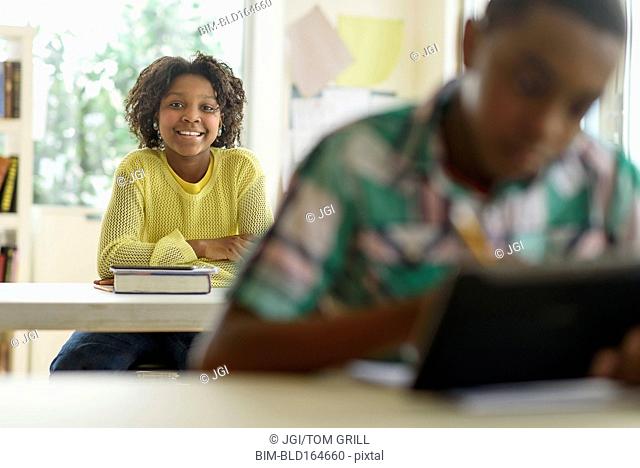 Black student smiling in classroom