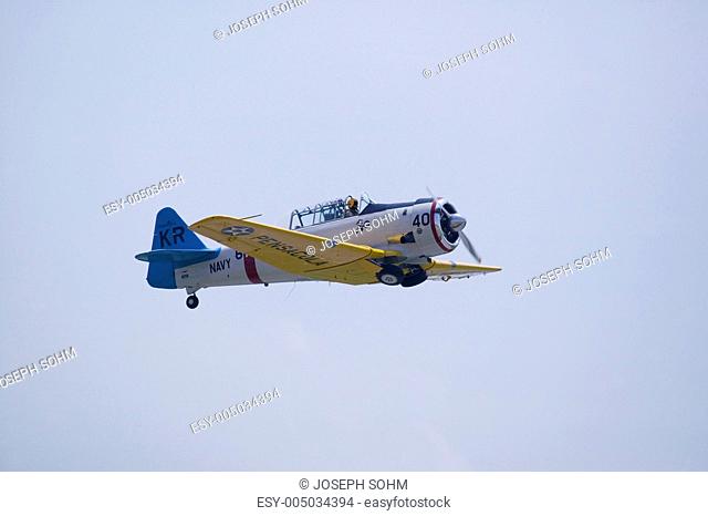 North American SNJ-4  SNJ-6 fighter plane from World War II, flying at Mid-Atlantic Air Museum World War II Weekend and Reenactment in Reading, PA held June 18