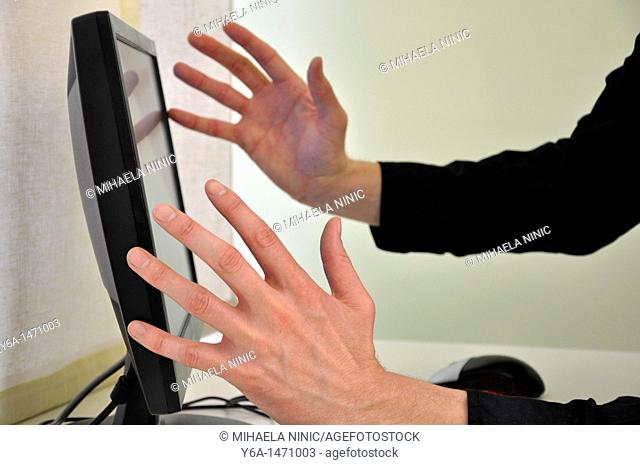 Frustrated businessman in front of computer focus on hands