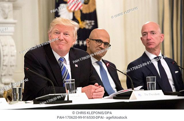 United States President Donald J. Trump (L-R) participates in an American Technology Council roundtable with corporate and eduction leaders including Microsoft...