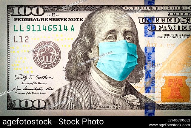Benjamin Franklin With Worried and Concerned Expression Wearing Medical Face Mask On One Hundred Dollar Bill