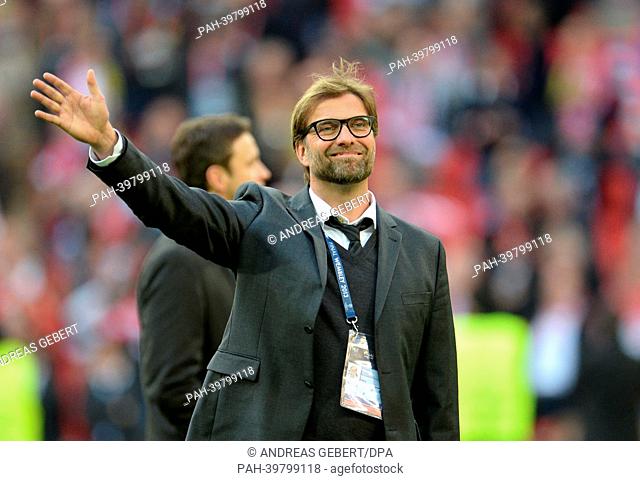 Dortmund's head coach Juergen Klopp waves prior to the UEFA soccer Champions League final between Borussia Dortmund and Bayern Munich at Wembley stadium in...