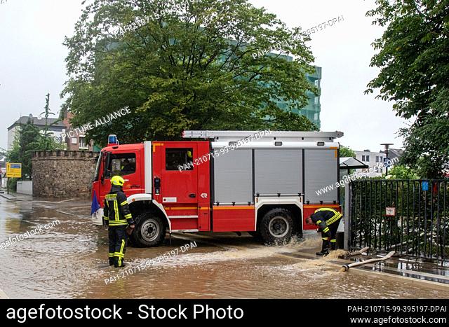 15 July 2021, North Rhine-Westphalia, Eschweiler: A fire truck stands at the side entrance of the hospital. Due to the flood situation