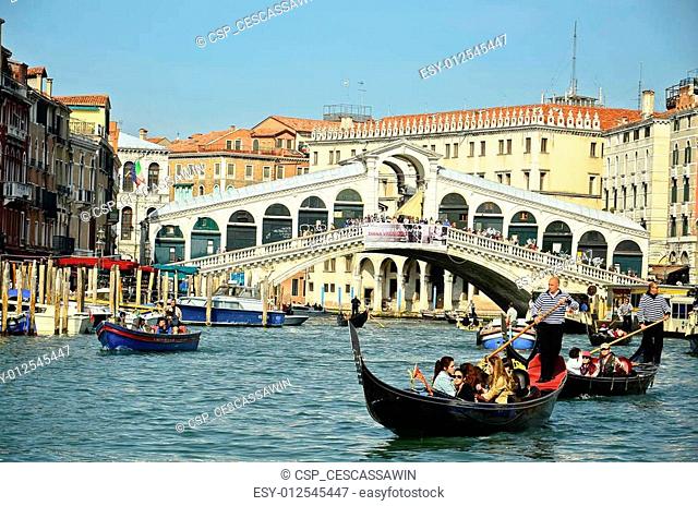 VENICE - March 28: Gondola at Rialto Bridge on March 28, 2012 in Venice, Italy. There were several thousand gondolas in the 18th century