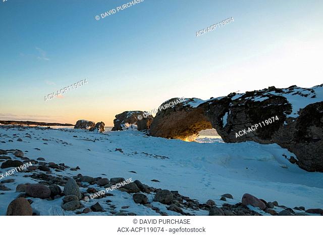 Sunset Through the Arches, Lime Stone rock formation, the Arches Provincial Park, Great Northern Peninsula, Newfoundland and Labrador
