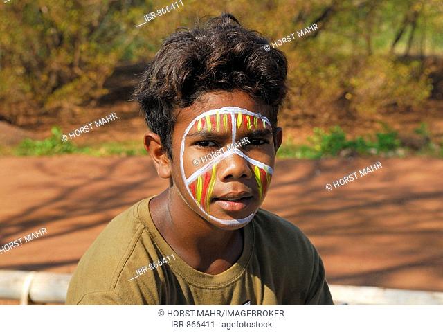Aboriginal boy posing for tourists, Tiwi Islands, Darwin, Northern Territory, Australia