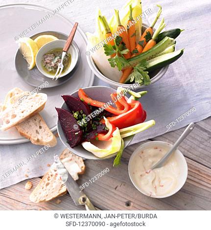 Vegetable sticks with hot mayonnaise and anchovy dip