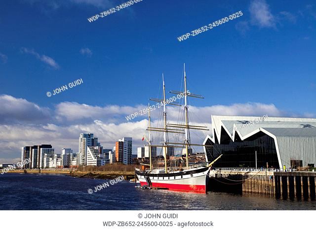 The Riverside Museum and The Glenlee, Glasgow, Scotland, UK. The transport museum is designed by architect Zaha Hadid. Situated on the former Inglis Shipyard