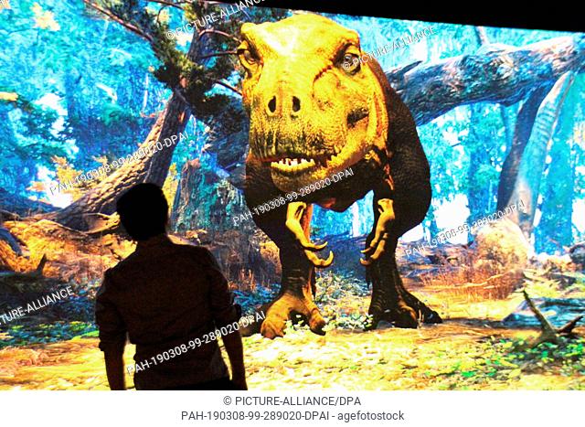 05 March 2019, US, New York: A Tyrannosaurus rex can be seen in an interactive video game at the press preview of the exhibition ""T