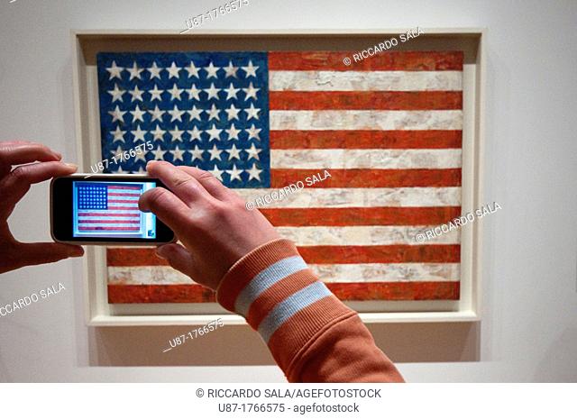 USA, New York, New York City, Manhattan, Museum of Modern Art, MOMA, Woman Taking Picture Using an iPhone, Flag By Jasper Johns