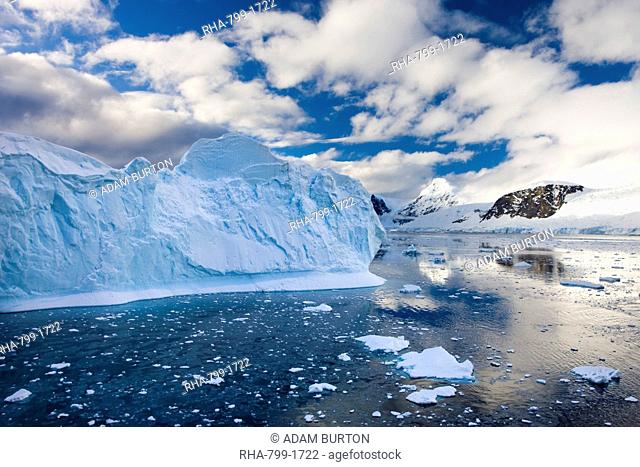 Icebergs, brash ice and mountainous terrain on the Gerlache Strait, Antarctic Peninsula, Antarctica, Polar Regions