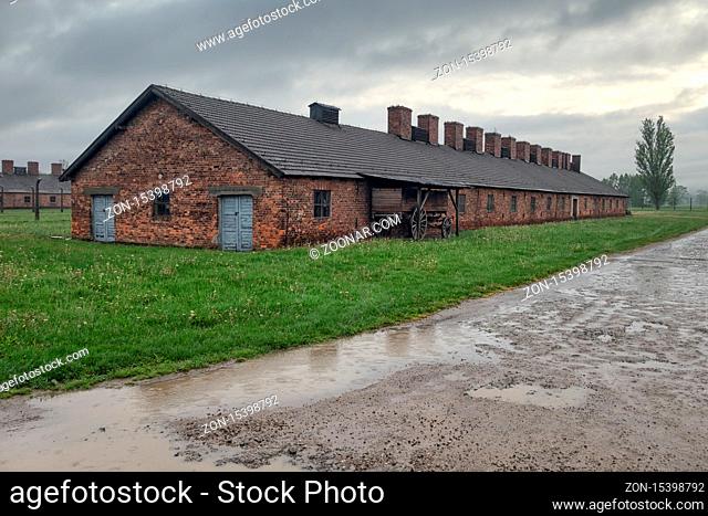 Auschwitz-Birkenau, Poland - May 15, 2019: Buildings of concentration camp Auschwitz at a rainy day