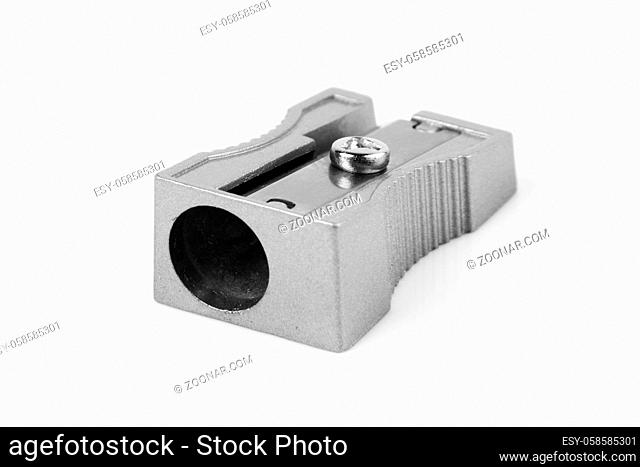 A pencil sharpener on white with shadow and selective focus