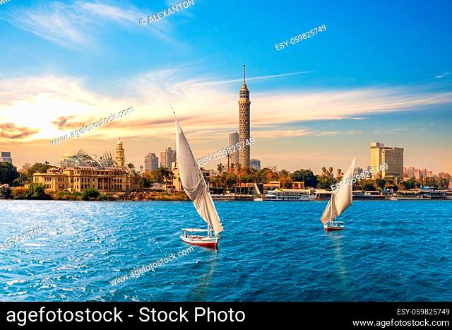 The Nile and feluccas in front of the Tower of Cairo, Egypt
