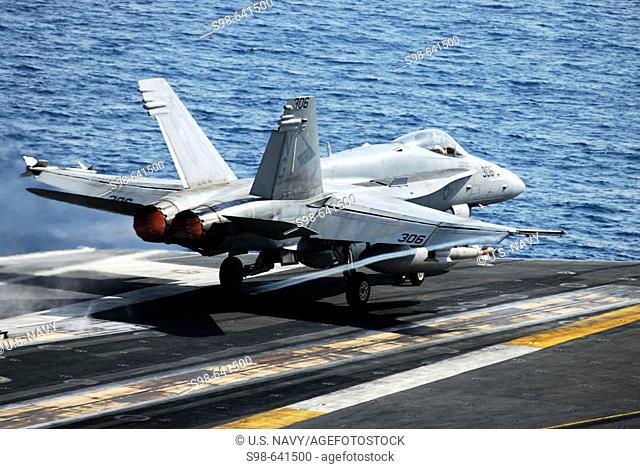 ARABIAN SEA (April 10, 2007) - An F/A-18C Hornet from the 'Blue Diamonds' of Strike Fighter Squadron (VFA) 146 takes off from the flight deck of the...