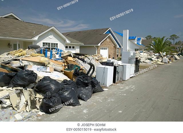 Row of suburban houses with debris after Hurricane Ivan in Pensacola Florida