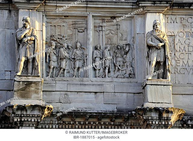 Statue of a Dacian prisoners and attic reliefs on the Arch of Constantine, Piazza del Colosseo, Rome, Lazio, Italy, Europe
