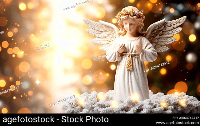 Christmas angel with snow and bokeh background