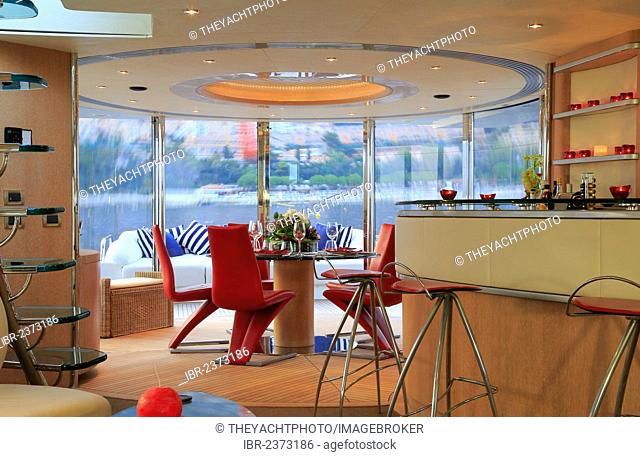 Dining area and bar on the main deck, Leonardo II, a cruiser built by Azimut, type of boat: Leonardo 98, length: 30.15 m, built in 2004, French Riviera, France