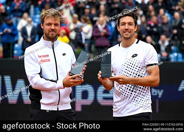 01 May 2022, Bavaria, Munich: Tennis: ATP Tour - Munich, Doubles, Men, Final. Krawietz (Germany) and Mies (Germany) - Hernandez (Spain) and Matos (Brazil)