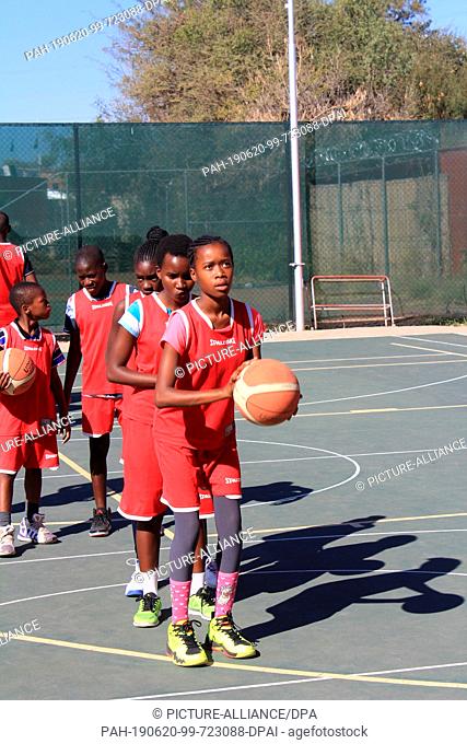 05 June 2019, Namibia, Windhuk: Children from poor families play basketball in Namibia's capital Windhoek in an institution financed with German aid money