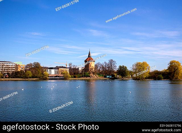 Malmo, Sweden - April 20, 2019: View over the lake in Pildammsparken with the former water tower