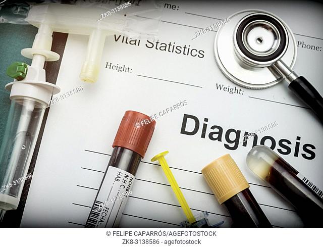 Diagnostic form, Vial of blood samples and Medicine in a hospital, conceptual image