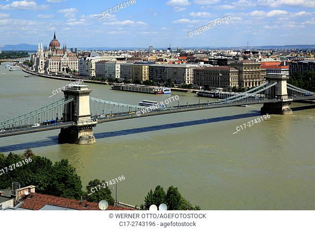 Hungary, Central Hungary, Budapest, Danube, Capital City, panoramic view from Buda across the Chain Bridge to Pest, behind the Hungarian Parliament