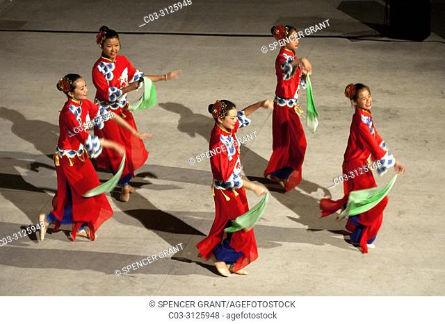 A Chinese American dance group performs ""Joyful Reunion"" at a celebration of Chinese New Year in Costa Mesa, CA