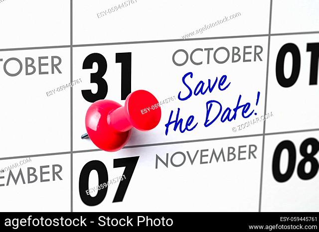 Wall calendar with a red pin - October 31