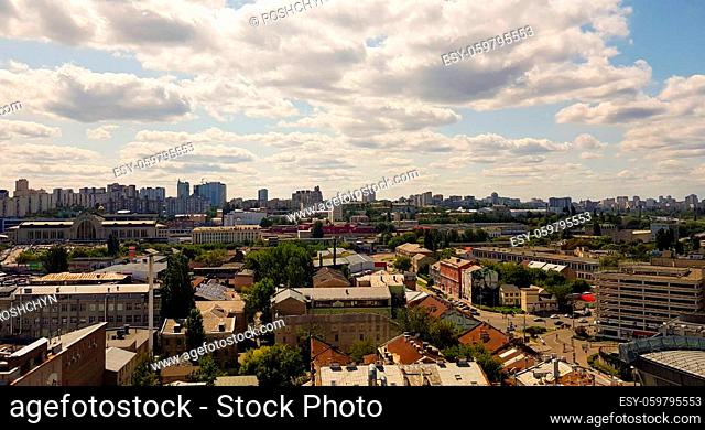 Aerial view of Kiev region with a modern city building mixed with historical, beautiful light at golden hour. City skyline of Kiev city from a bird's flight