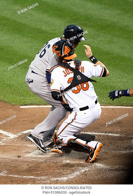 New York Yankees designated hitter Carlos Beltran (36) steals home in the second inning against the Baltimore Orioles at Oriole Park at Camden Yards in...