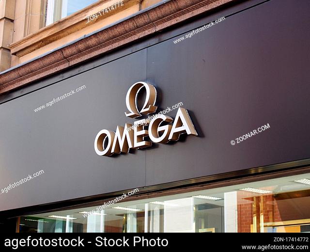 leeds, west yorkshire, united kingdom - 7 july 2021: logo and slogan on omega boutique store on commercial street in the centre of leeds