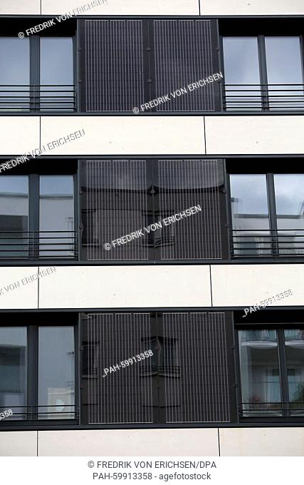 In an enviromentally-designed building in Frankfurt, Germany, solar panels line the exterior buildings, 8 July 2015. Water and heating is produced from a...