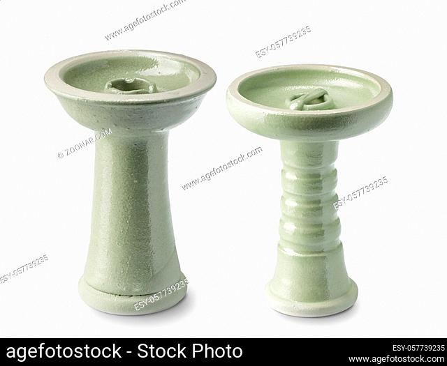 Close up of two beautiful handmade ceramic hookah head or bowl for tobacco isolated on white background