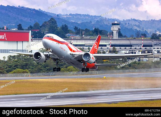 A Boeing 767-200BDSF aircraft of 21 Air with registration N999YV takes off from Medellin Rionegro airport, Colombia, South America