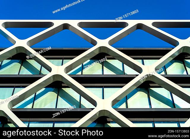 Madrid, Spain - June 19, 2020: Detail of facade of new contemporary office building in Las Tablas area