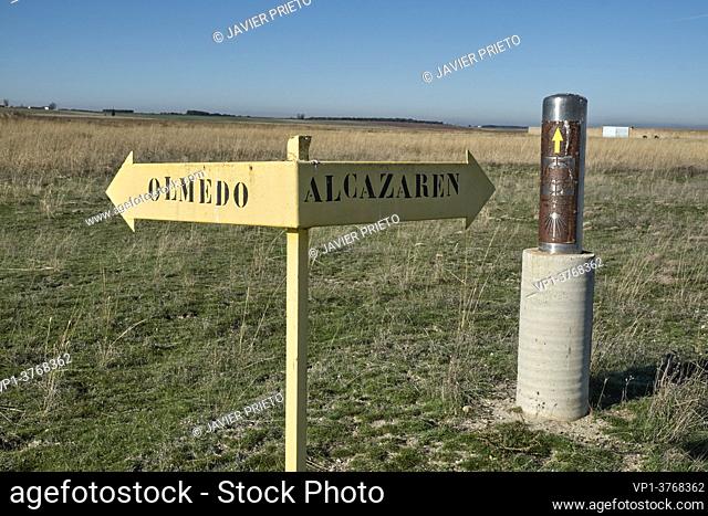 Deviation signs to Olmedo in Llano de Olmedo. Camino de Santiago de Madrid as it passes through Valladolid. Castilla and Leon. Spain