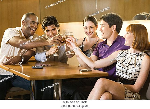 Five friends in a bar