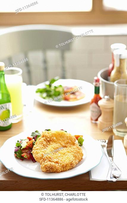 Breaded escalope with a vegetable salsa