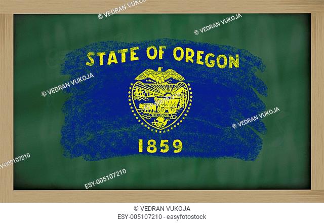 flag of us state of oregon on blackboard painted with chalk
