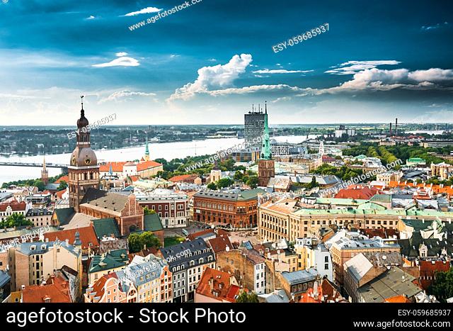 Riga, Latvia. Riga Cityscape In Sunny Summer Day. Famous Landmarks - Riga Dome Cathedral And St. James's Cathedral, or the Cathedral Basilica of St